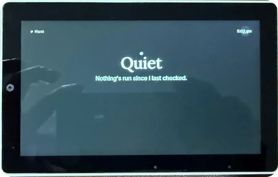 The device showing Hum in its quiet state, reading: Quiet — nothing's run since I last checked.